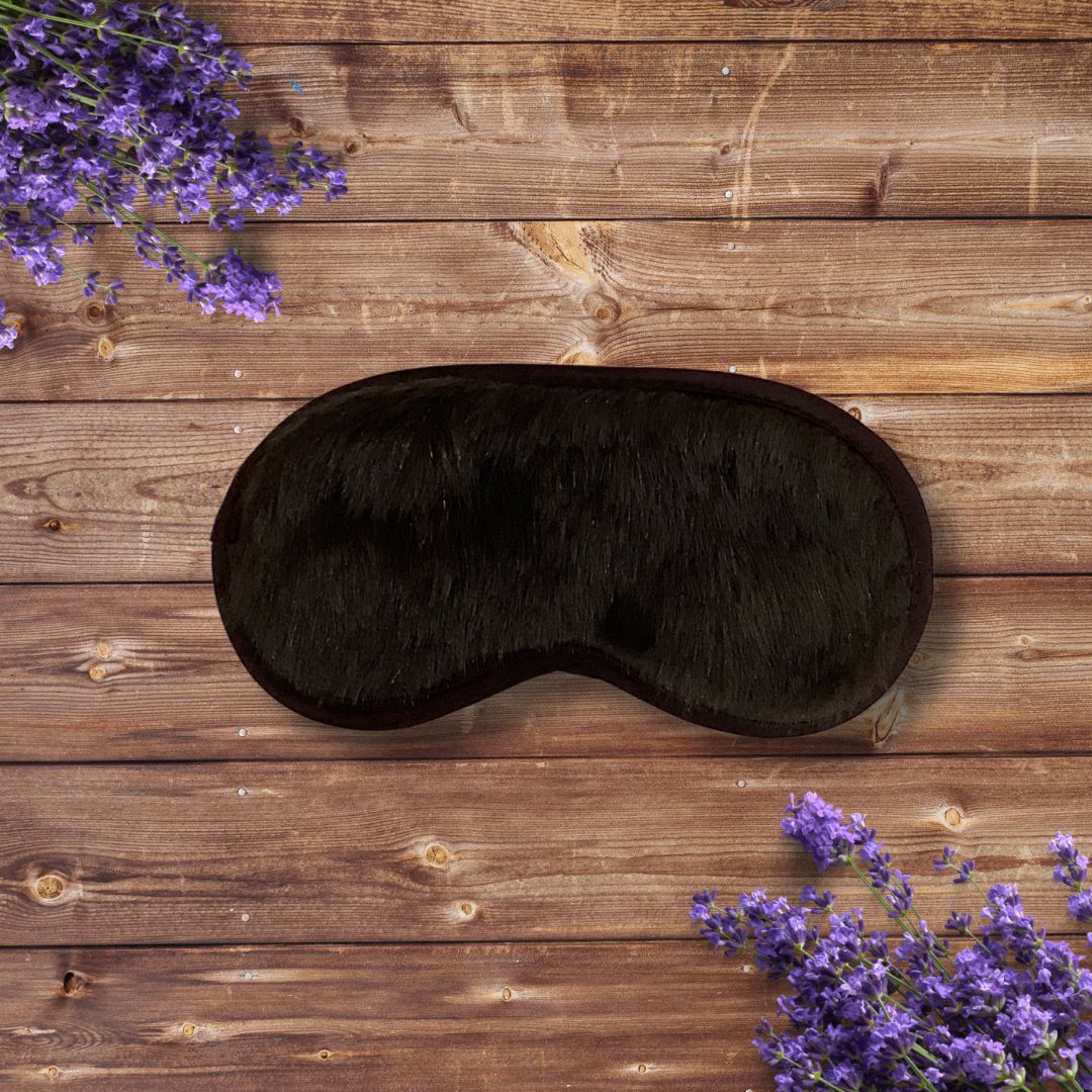 Faux Mink Sleep Mask on Brown Wood 