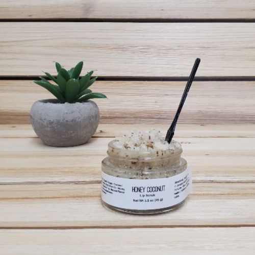 Honey Coconut Lip Scrub next to plant open lid